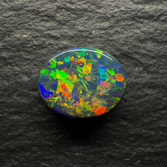 1.2ct Gem Black Opal, This Stone Has A Vivid Multi Color Palette With A Mixed Pattern