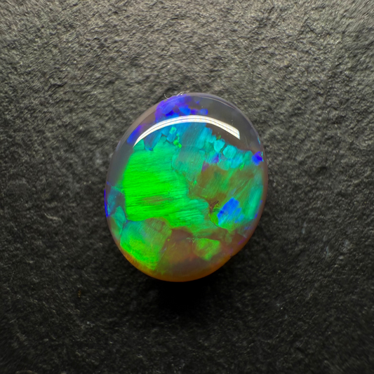 2.27ct Gem Black Crystal Opal, This Gem Has a Vivid Green-Blue Blocky Pattern, Lots of Depth And A Honey Like Glow From Within The Stone