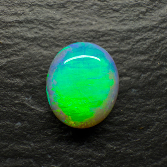 1.7ct Gem Dark Crystal Opal, This Gem Has A Phenomenal Cats Eye Pattern That rolls Across The Stone With Movement