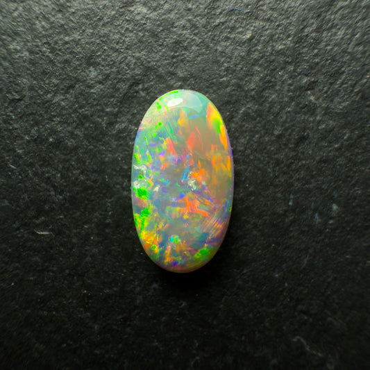 0.83ct Dark Crystal Opal With Lovely Multicolor Palette And Lots Of Depth
