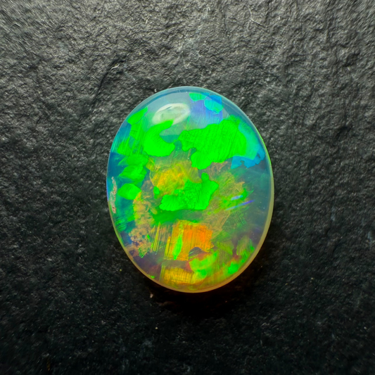 0.8ct Gem Crystal Opal, This stone Has A Blocky floral Pattern, Vivid Greens and Golds And Lots Of Depth