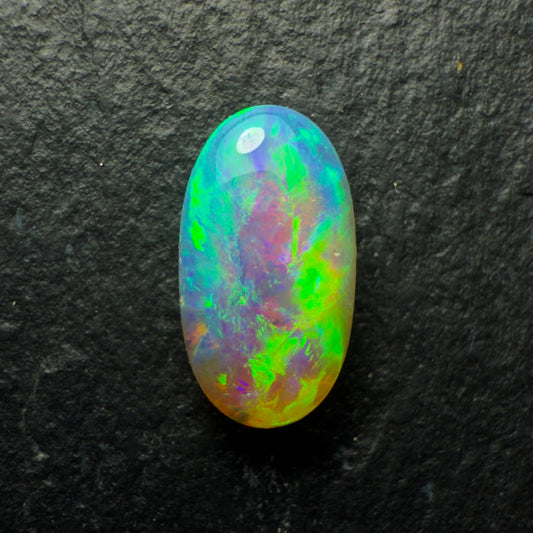 1.0ct Drak Crystal Opal. This stone Has A Rich Green-Gold Color Palette Undertones Of Blue And Lots Of Depth