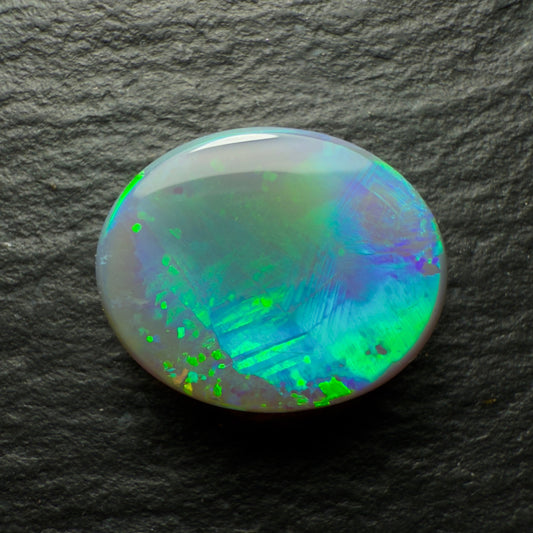 2.44ct Dark Opal, This Gem Has An Unusual Mix Of Patterns And A Pastel Blues And Green Color Palette