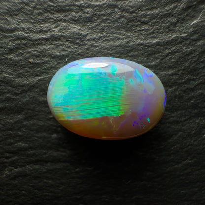 2.99ct Black Opal With A Bright Minty Green Broadflash and Chaff Pattern