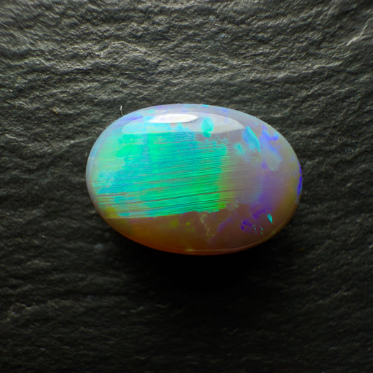 2.99ct Black Opal With A Bright Minty Green Broadflash and Chaff Pattern