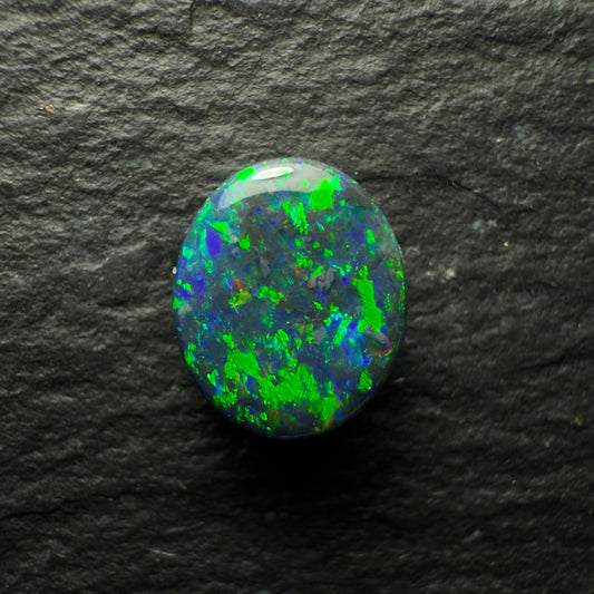 0.76ct Black Opal, This Gem Has Speckled mossy Pattern With A Green, Blue Color Play