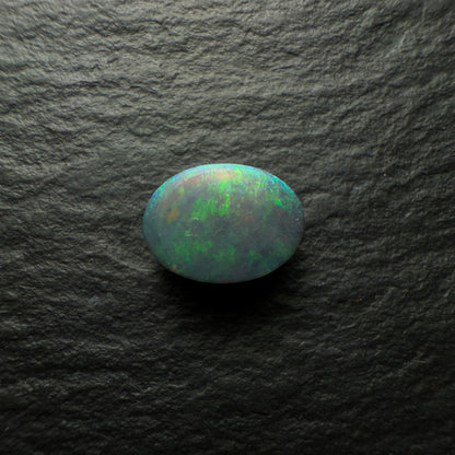 0.75ct Black Opal, This Gem Has A Moss Pattern And Blue Green Color Palette