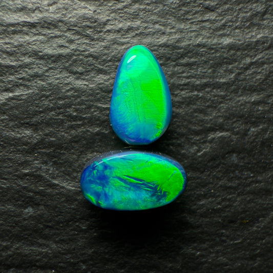 Mismatched Black Opal Pair With Brilliant Green Broadflash Pattern And Blue Undertones