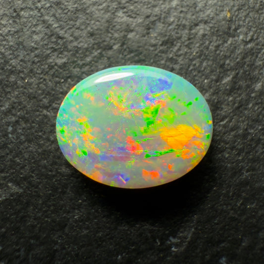 0.7ct Crystal Opal This Gem Has A Lovely mix Of Colors And Depth