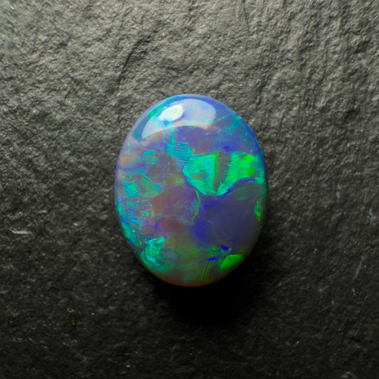 1.0ct Black Opal, This Gem Has Lovely Green Blue Color Palette And A Flagstone Like Pattern