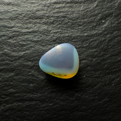 1.29ct black Opal, This Gem Has A Bright Green Blue Color Pallet With Rays Of Color Rolling Across The Stone