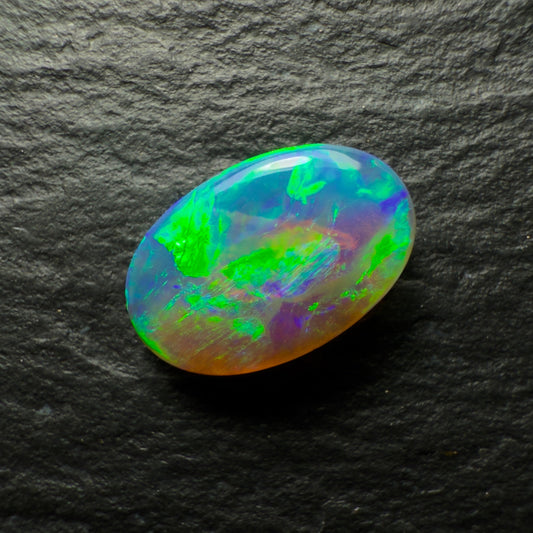 0.96ct Dark Crystal Opal, This Gem Has Bright Greens, Golds and Hints Of Blue
