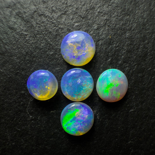 (Price For Parcel) 26 Small Crystal opals rounds, With Blues Green And Purple
