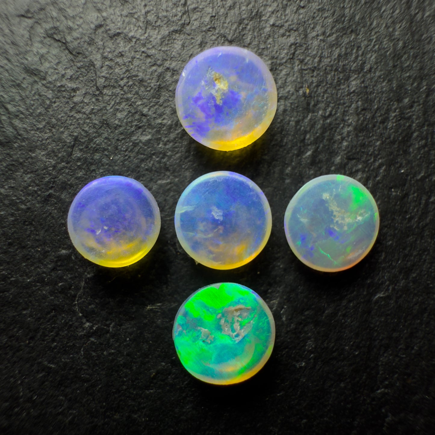 (Price For Parcel) 26 Small Crystal opals rounds, With Blues Green And Purple