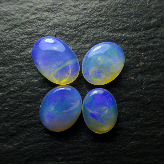 (Price For Parcel) Crystal Opals With A Dark Violet Colorplay