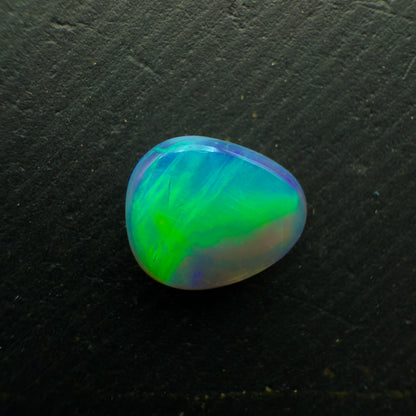 0.7ct Black Opal, This Stone Has An Vivid Green-Blue Rolling flash