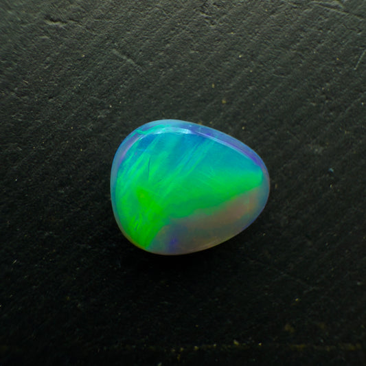 0.7ct Black Opal, This Stone Has An Vivid Green-Blue Rolling flash
