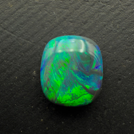 0.78ct Affordable Cushion Cut Black Opal With Rich Blues And Greens