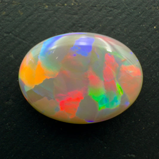 3.0ct Dark Opal With A Pink-Muliticolor Flagstone Pattern And A sunset Color Palette