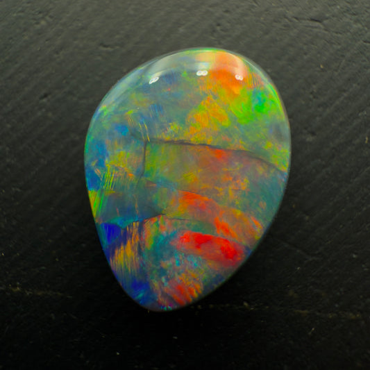 6.1ct Gem Black Opal With A Red-Multicolor Palette and Rare Flagstone Pattern