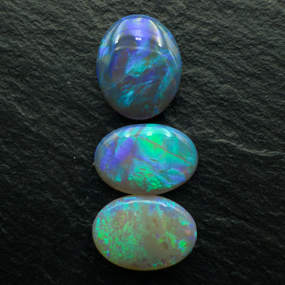 4.5ct Bundle (Price For Parcel) Larger Dark Opals With Minty Greens And Blues
