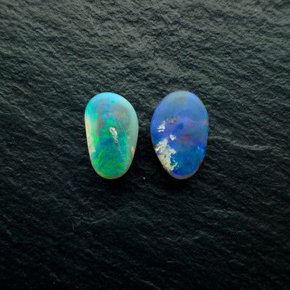 2.33ct Mismatched Pair (Price For Parcel) Black Opals With Blues And Greens And A Freeform Shape