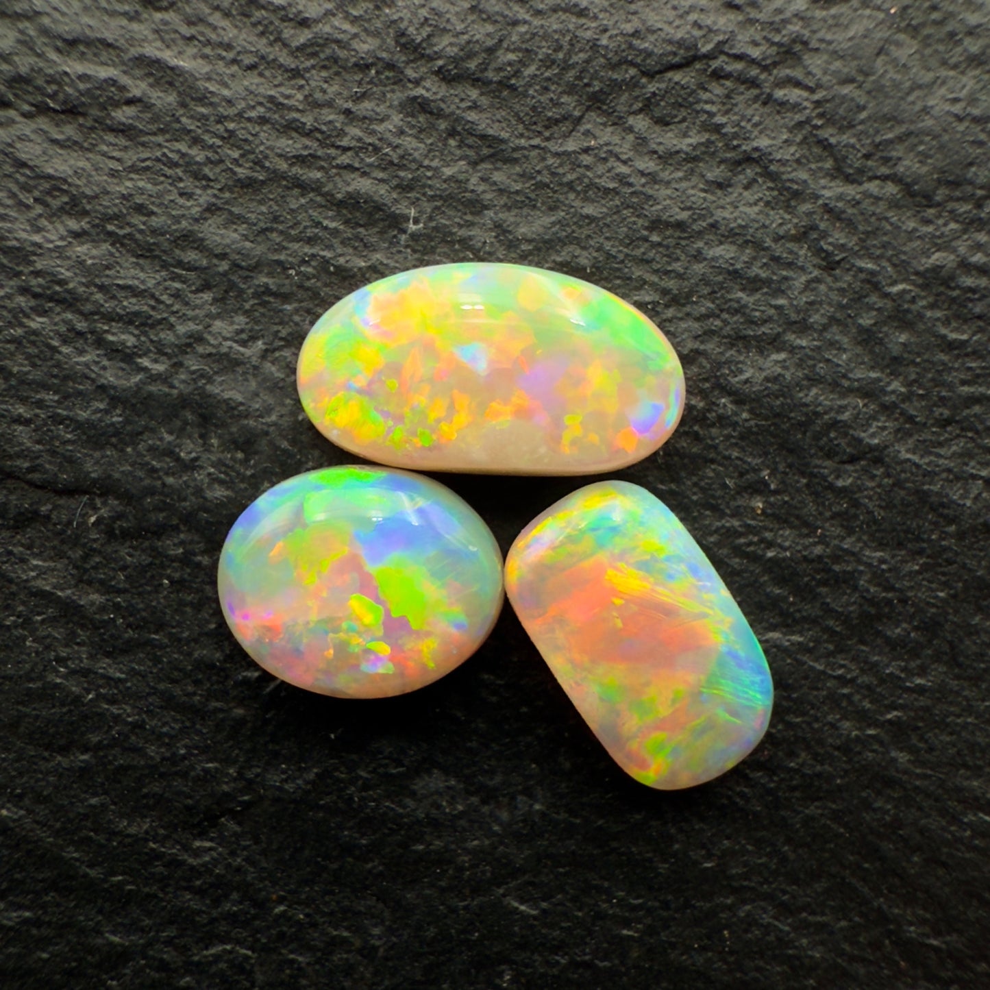1.58ct (Price For Parcel) Small Bright Crystal opals With Warm Colors