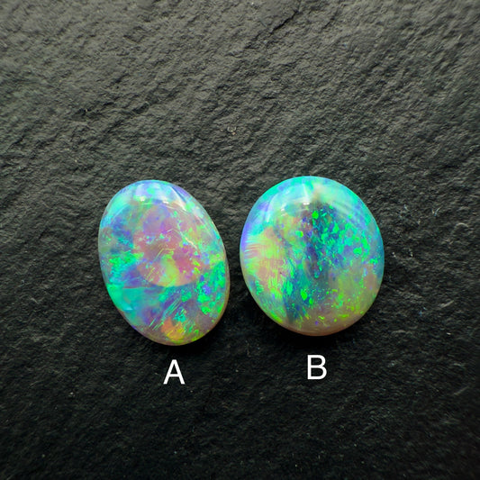 (Price Per Stone) Dark Crystal Opals With Greens , Yellows And Good Color Dispersal