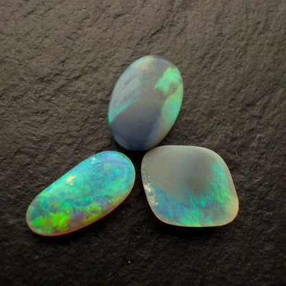 (Price Per Stone) Dark Opals With Vivid Aqua Colors And Moss Patterns