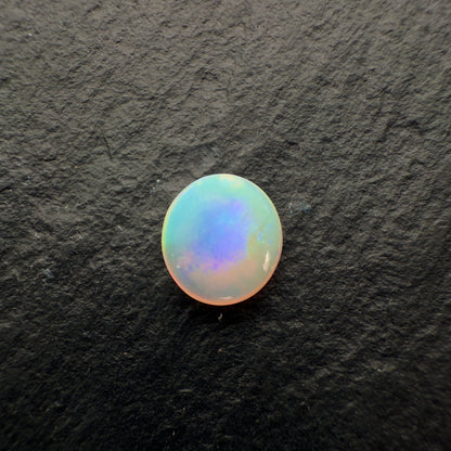 0.8ct Crystal Opal With A Beautiful Mango Color Palette And Lots Of Depth