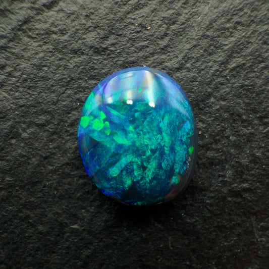 0.73cts Black Opals With Vivid Blue-Green Color Play And A Moss Pattern