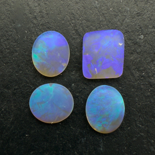 2.34ct Bundle (Price For Parcel) Matte finished opals with a soft purple-green glow
