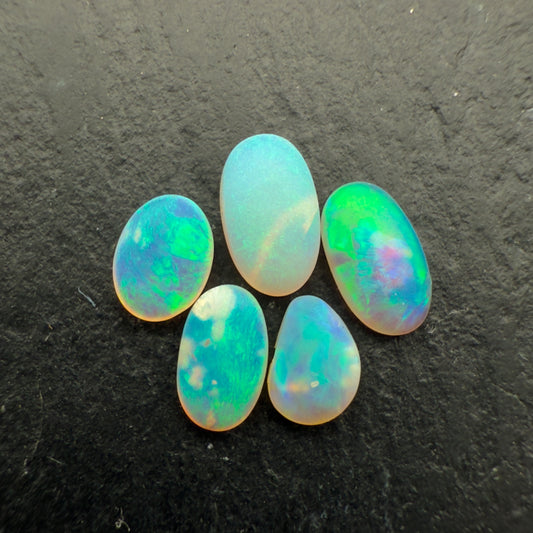 1.1ctct Bundle (Price For Parcel) Matte finished opals with a soft green glow