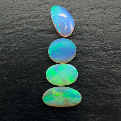 2.3ct Bundle (Price For Parcel) Matte finished opals with a soft green-blue glow