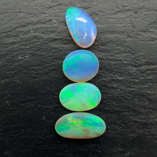 2.3ct Bundle (Price For Parcel) Matte finished opals with a soft green-blue glow