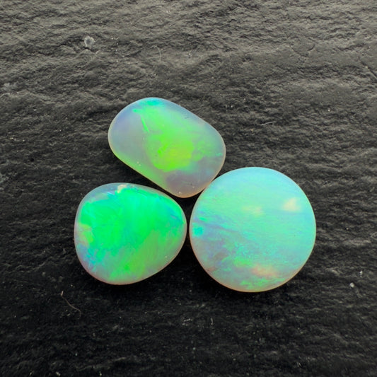 1.1ct Bundle (Price For Parcel) Matte finished opals with a soft purple-green glow