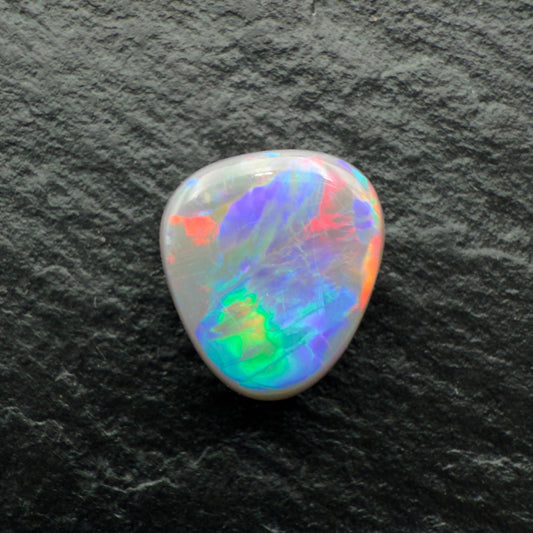 2.2ct Dark Opal With pastel Red Blue and Hints Of Green