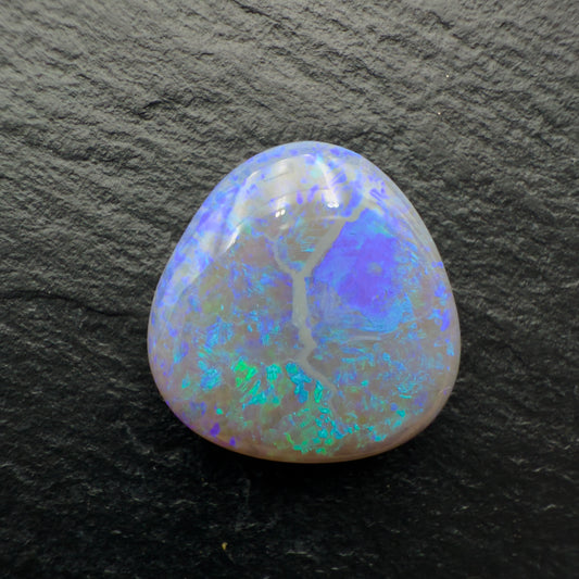 9.4ct Dark opal with a Freckled Blue Green Pattern