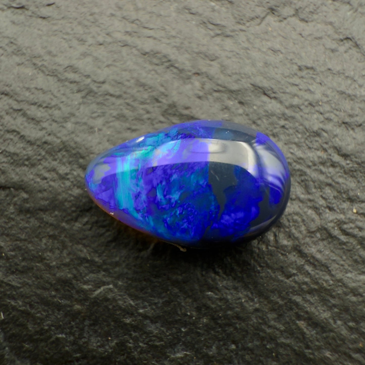 0.71ct Affordable Black Opal Showing An Array Of Blues