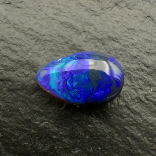 0.71ct Affordable Black Opal Showing An Array Of Blues
