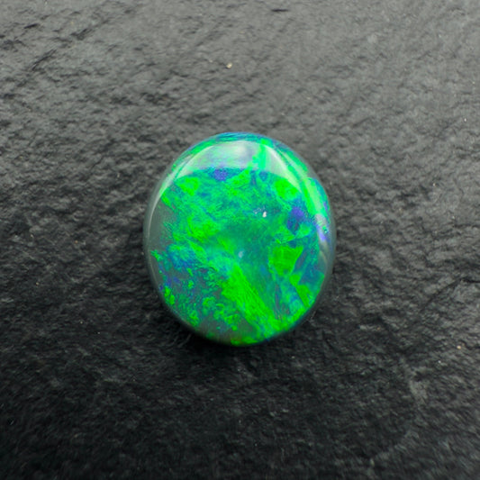 1.0ct Gem Black opal With vivid Green and Hints Of Blue