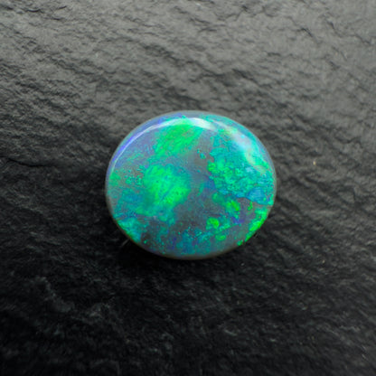 1.6ct Gem Black opal with a unique pattern and minty green color palette