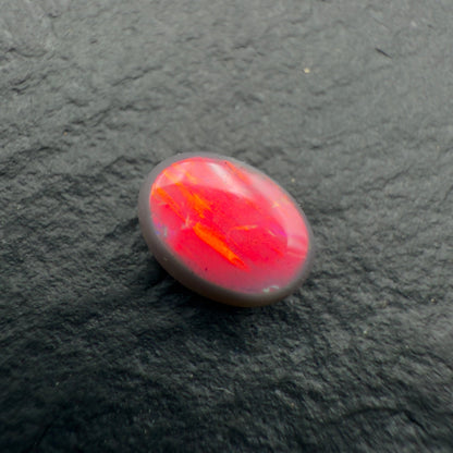0.55ct Top Gem Black Opal With Ultra Rare Pigeons Blood Red color