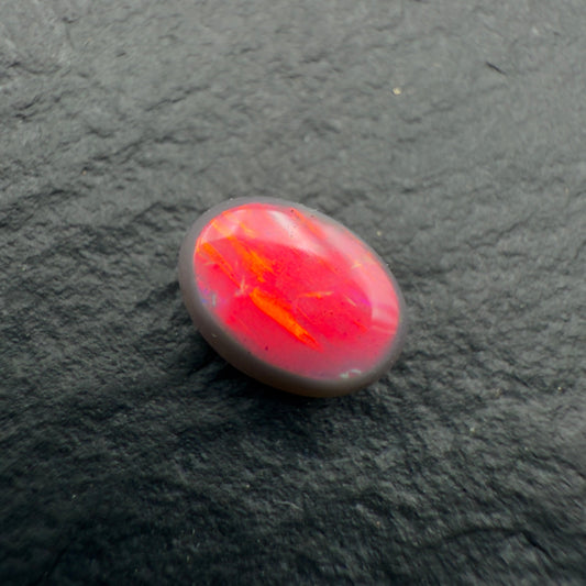 0.55ct Top Gem Black Opal With Ultra Rare Pigeons Blood Red color