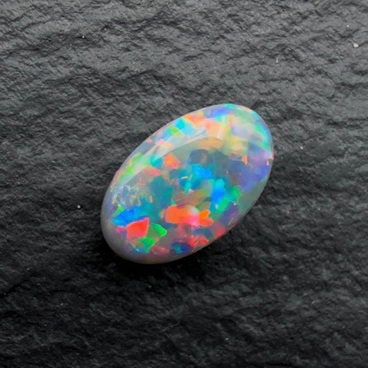 0.49ct Top Gem Black Opal With Rare Red-Blue floral Pattern