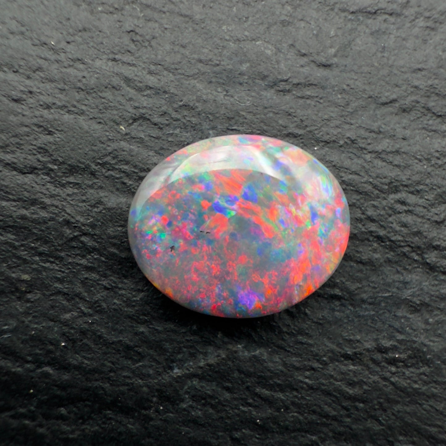 0.72ct Gem Dark Opal With Vivid Red - Multicolor Speckled Pattern