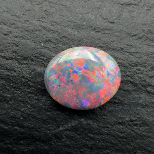 0.72ct Gem Dark Opal With Vivid Red - Multicolor Speckled Pattern