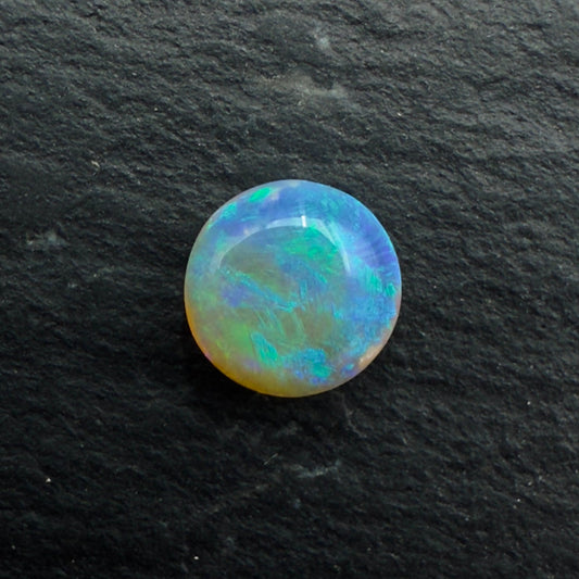 0.65ct Affordable Round Crystal Opal With Rich pastel Greens and Blues