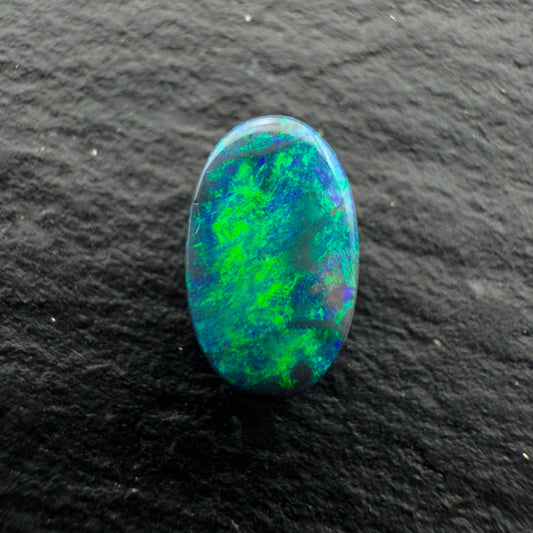 0.95cts Gem Black Opal With A Deep Green Blue Broadflash Pattern