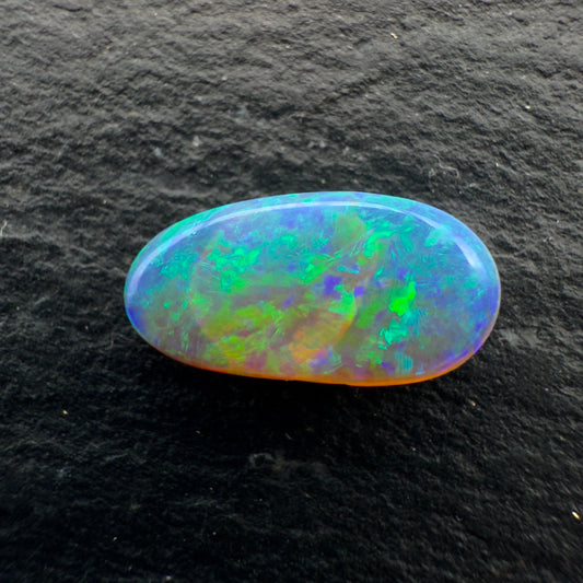 0.95cts Gem Crystal Opal With A Mixed Deep Green Blue Gold Pattern